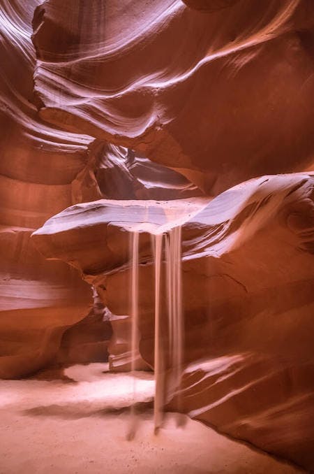 sand falling in a sand cave